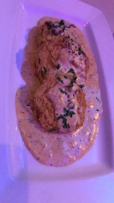 Fried green tomatoes with crawfish sauce