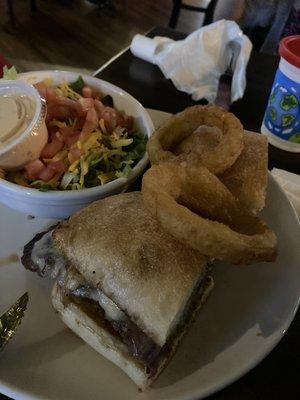 Steak sandwich and side salad