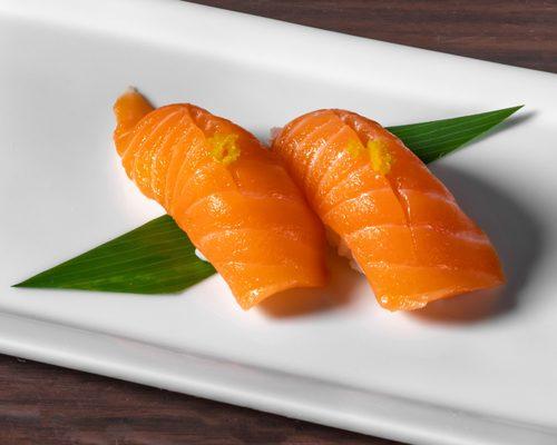 Salmon Sushi with yuzu on the top