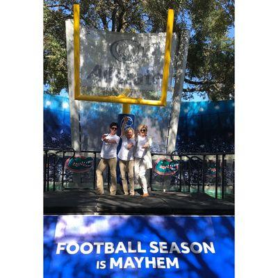 Attended SEC sponsorship game at University of Florida vs Vanderbilt, greeting fans and taking pictures with goal post "Football is Mayhem"