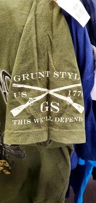 The sleeve of a shirt I liked. Says, "Grunt Style. US 1776. GS. THIS WE'LL DEFEND".