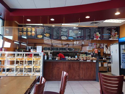 Efficient prep and serving area.  About 15 different kinds of bagels where customers can actually SEE them.