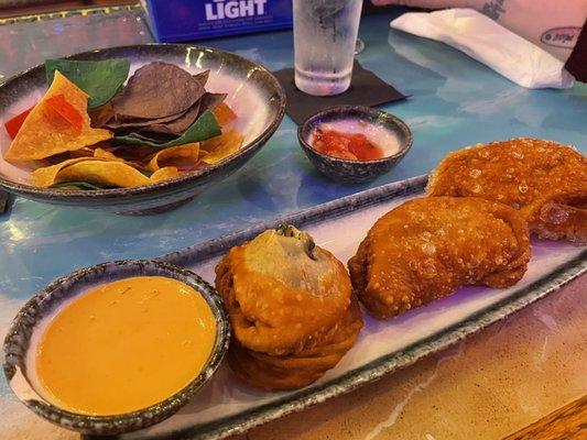 Empanada Flight with Boom Boom sauce.