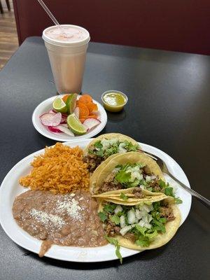 Taco (carne asada) combo plate. Agua Frescas (cantaloupe melon).