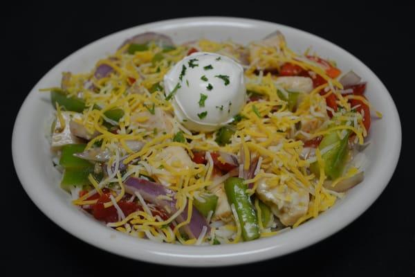 Fajita rice bowl - sour cream cools off the light, zippy sauce.