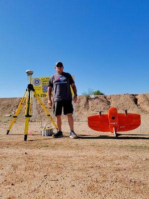 Owner Cole Harvey next to the Wingtra RX1 Drone for our Photogrammetry Survey's about to take off to do a survey.