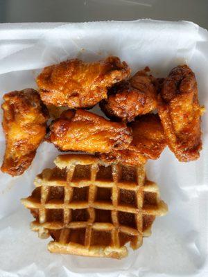 waffle and wings tossed in mango habenaro