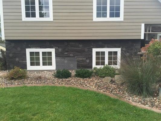 Total Home Window Replacement with stunning rock facing added