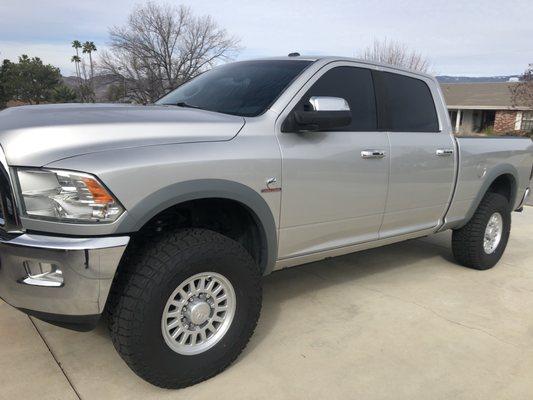 2013 Ram 2500 with some new wheels and tires. This customer has quite a bit done here including onboard air a mild lift.