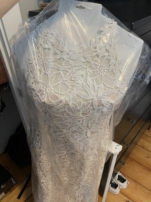 A very white lace wedding dress after cleaning!