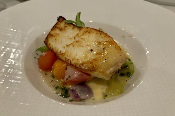 Halibut in a seafood herb broth with seasonal veg