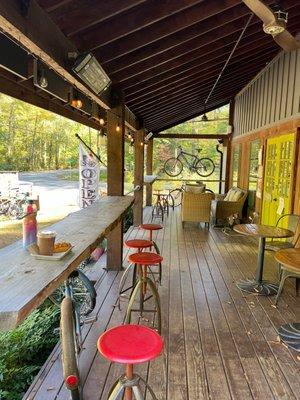 Excellent outdoor sitting area to enjoy your food or beverages and watch the bicyclists on the trail. And lots of places to park bicycles.