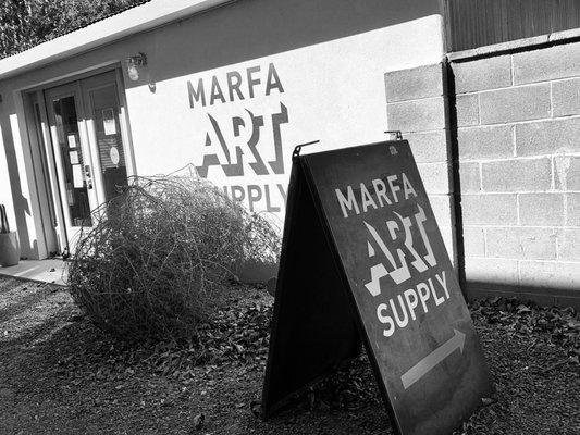 Marfa Art Supply with gigantic tumble weed!