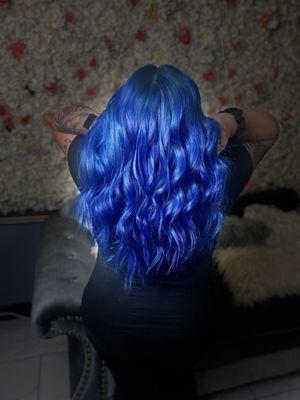 Vivid blue hair! Book this color or any other color with us.