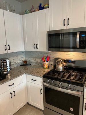 Installation of my tile backsplash in the kitchen