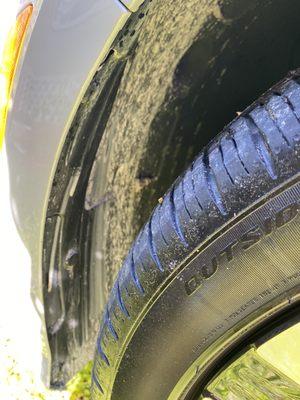 This is what dirt a tire shine mixed together looks like.  Look at this cleaned wheel well.