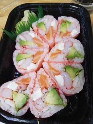 Pink Lady Roll - salmon, avocado , crab meat, cooked shrimp, cream cheese, with soy paper