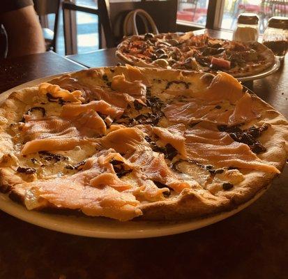 Al Salmone , ( foreground ) $19 & Capricciosa ( background) $18