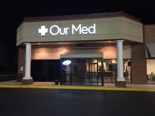 Photo of the OurMed clinic at night