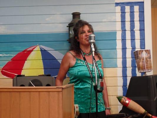 Tina Hoffman entertains the crowd at Wilma's Patio.