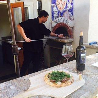 Summer Pizza & Wine Pairing made to order in our outdoor Chef's Theatre