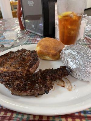 Sirloin with baked potato and dinner roll