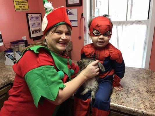 Christmas Elf (Dr Dye) & the amazing spider man keep an eye on the babies!