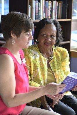 Care Manager discussing programs with potential client.