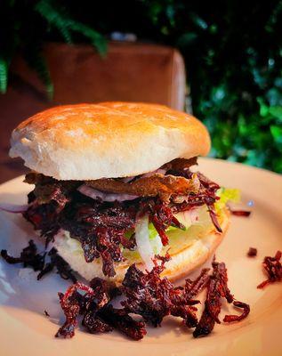 Top Burmese crunchy beef sandwich.