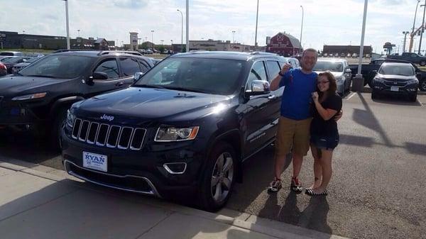 My fiance and his new car!