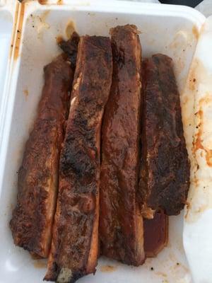 1/2 rack of ribs - request well done if you want fall off the bone. just tell them what you want.