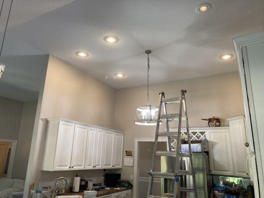 Painted the ceiling throughout the house along with the baseboards.