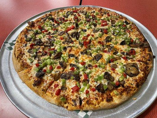 Extra large veggie pizza (substituded green peppers for black olives)