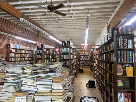 Stacks and stacks of books getting ready to sell!