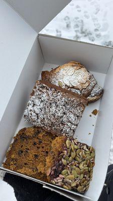 Almond crossiant, blueberry coffee cake, pumpkin chocolate bread, and harvest bar