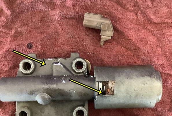 Here is a picture of the marking on the shift solenoid and the broken connector.