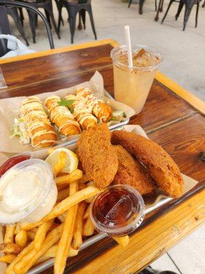 Fish & chips and elote egg rolls with an apple pie cocktail