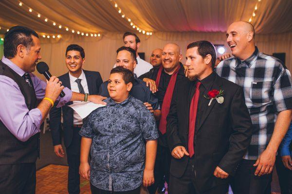 educating our nephew about the garter toss hahah