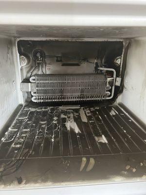 Replacing defrost heater on top mount refrigerator