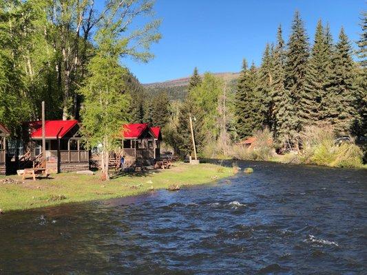 View of cabins along the river