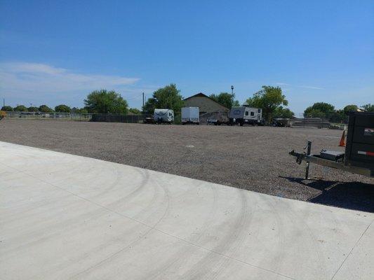 Marked parking spaces for RVs, trailers, boats.