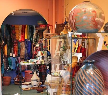 A corner of the shop, lots of scarves in the alcove.