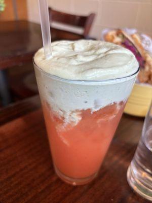 Tropical juice with matcha foam