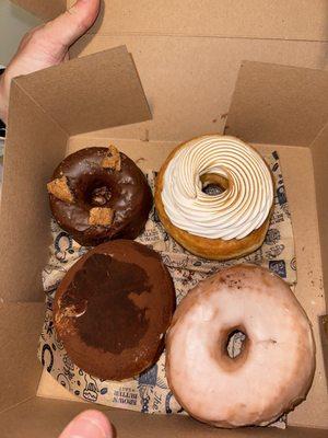 From top left clockwise- Gf chocolate chip cookie donut, strawberry tres leches, glazed, tiramisu