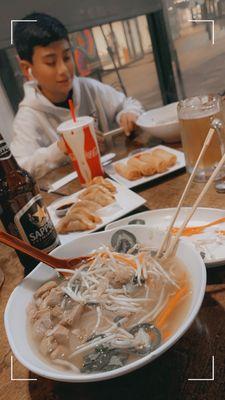 Chicken pho, chicken egg roll, and gyoza