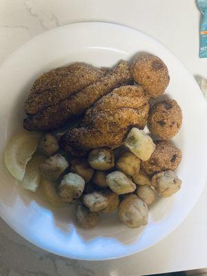 Catfish, hush puppies, okra. Family Fish is $33 for 24pc + 12 hush puppies, works out to a better price/head over individual boxes. JUL23