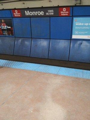 A CTA train stop sign at Monroe CTA Red Line subway.