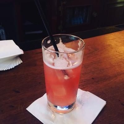 Four roses bourbon and ginger with lime and seltzer. Refreshing and well balanced.