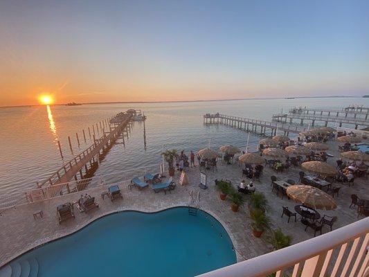 View from water view balcony at sunset tiki bar below