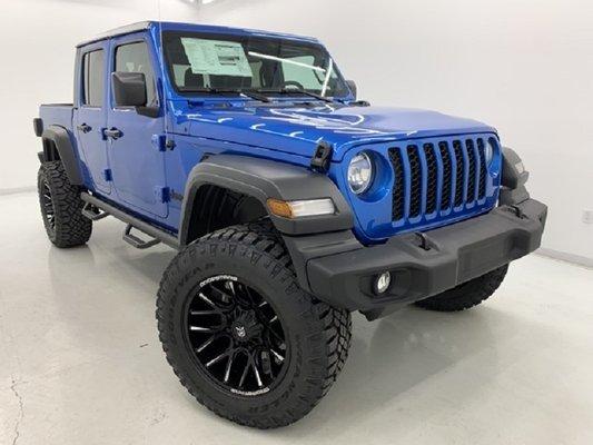 2020 Jeep Gladiator with SkyJacker lift plus New wheels and tires.